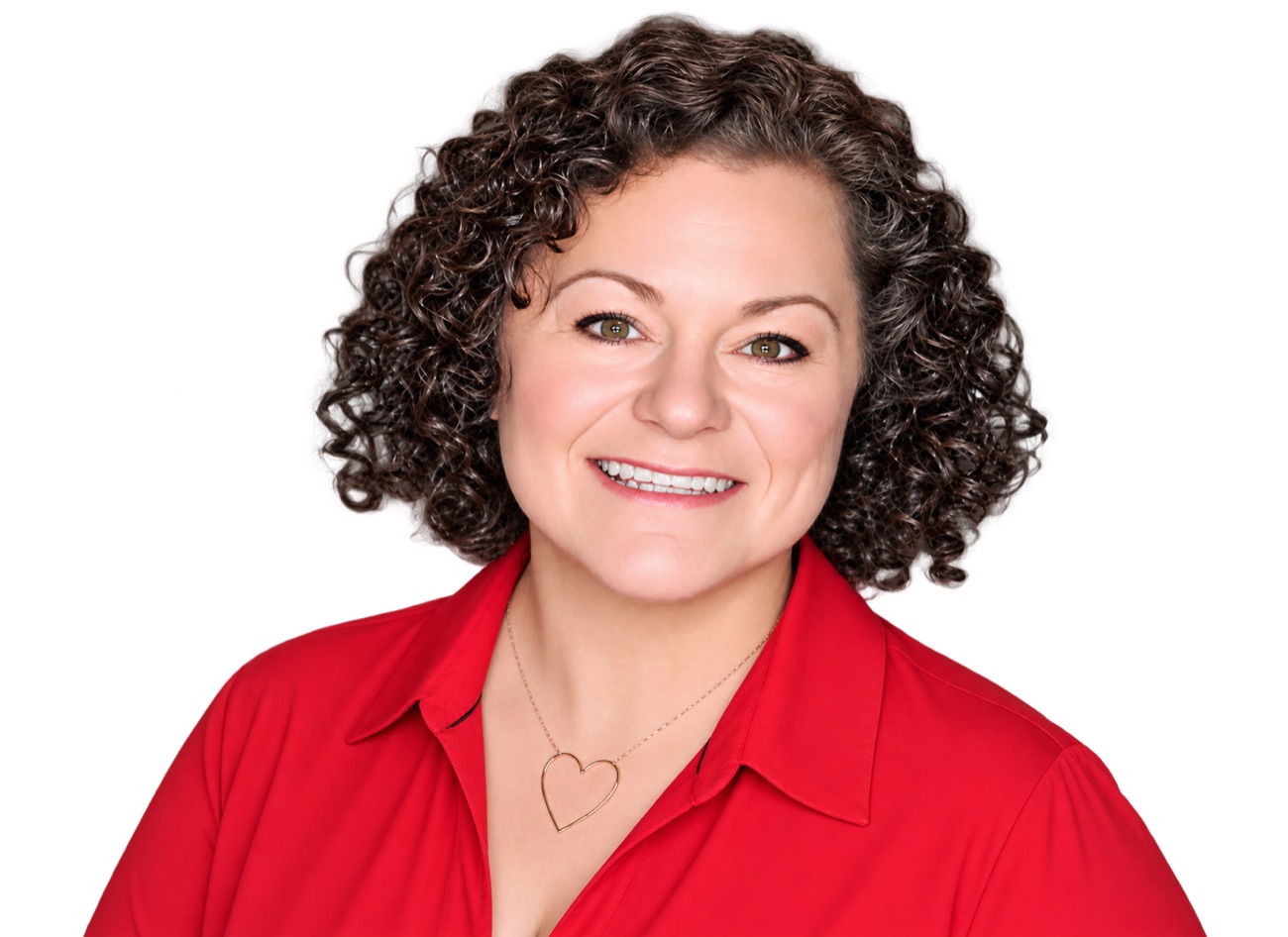 Pattie Philibosian, smiling, in a red shirt
